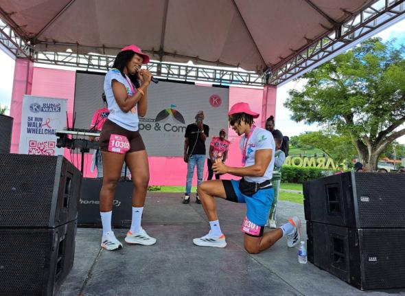 Errol Granston, operator of the Montego Bay-based Run Squad 876 running club, proposes to his girlfriend and fellow running enthusiast, Natasha Rhoden, during the 17th staging of the Kiwanis Club of Providence Montego Bay’s 5K event at Harmony Beach Park