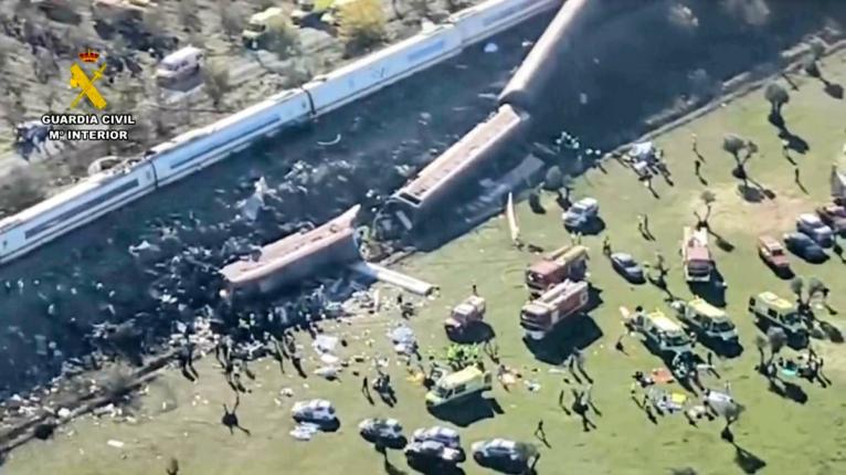 An aerial view of carriages and first responders on the site of a collision between two trains in Urda, Spain, on Wednesday.