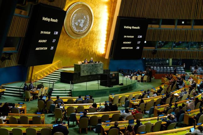 The results of a vote on ending the United States' blockade of Cuba are displayed at United Nations headquarters.