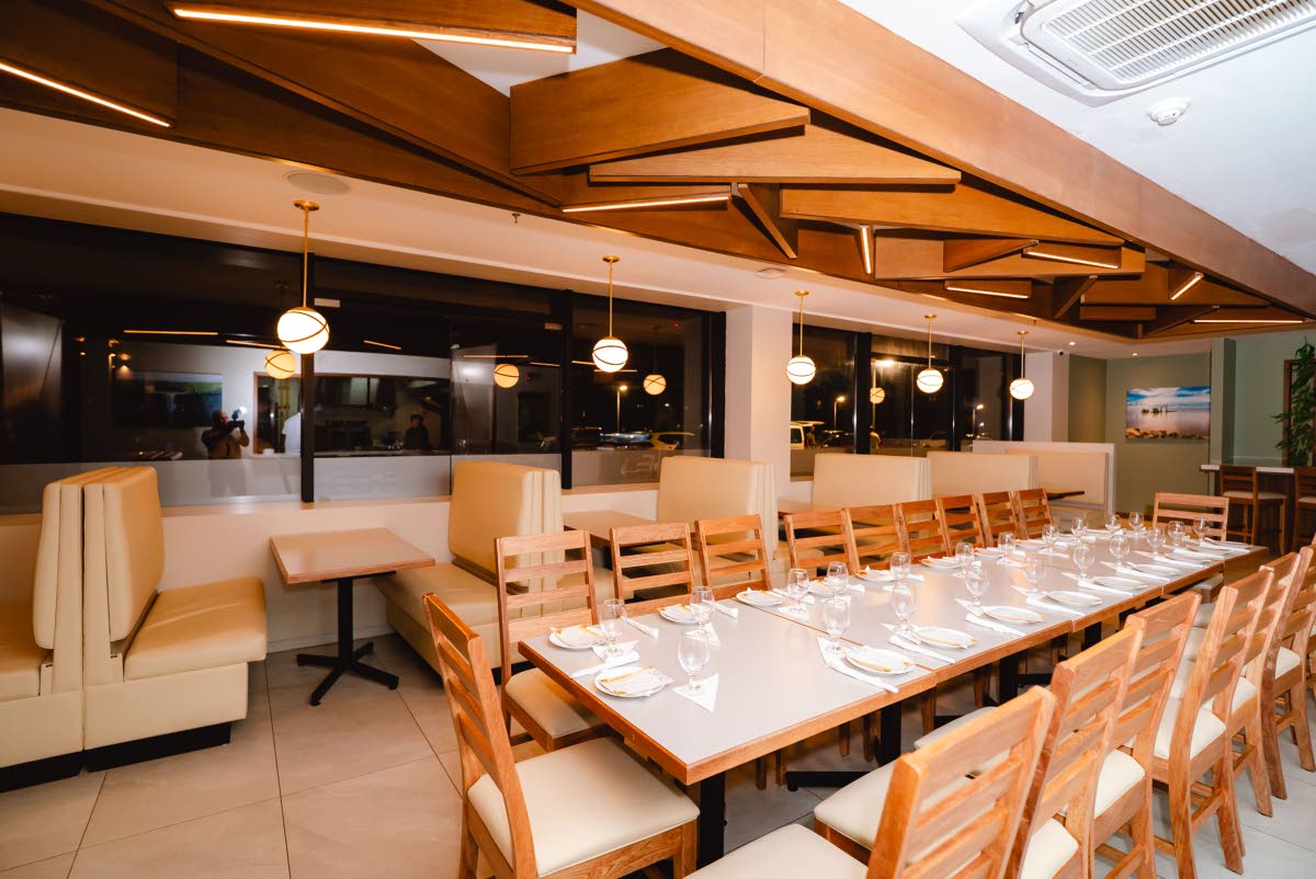 The dining room at 519 Guyana, with its cricket-themed lighting features. 