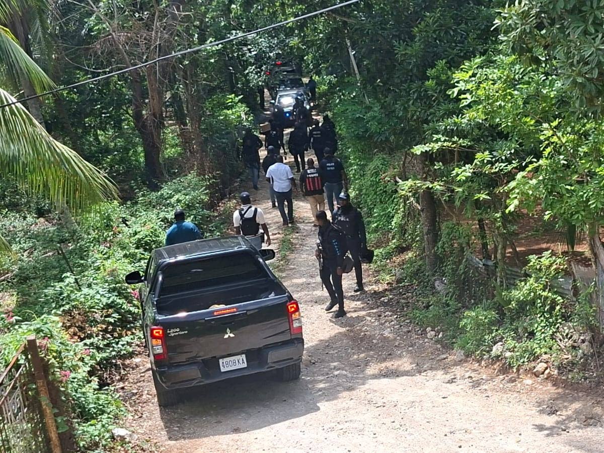 Police at the scene of a deadly attack on cops in the Sligoville area of St Catherine on October 16, 2026.