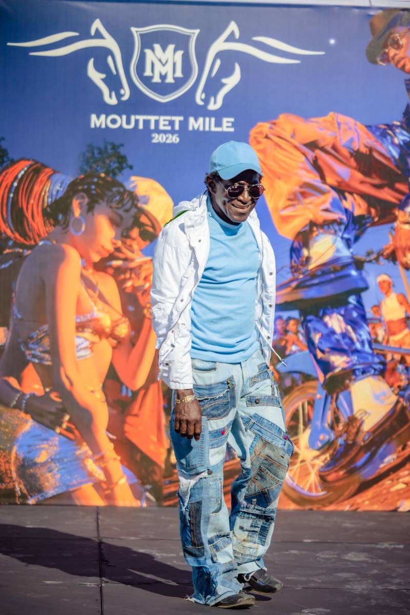 Celebrated local designer, Earl ‘Biggie’ Turner, renowned for his work with denim, models one of his designs, an ‘upcycled’ piece, a patchwork of different parts of denim trousers. 