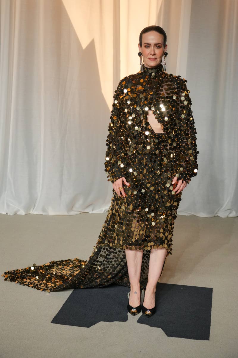 Sarah Paulson, styled by Karla Welch, wears a three-piece silk-chiffon ensemble from Ferragamo’s Spring/Summer 2027 collection, featuring gold embroidery, crystal drops and antique gold sequins. 