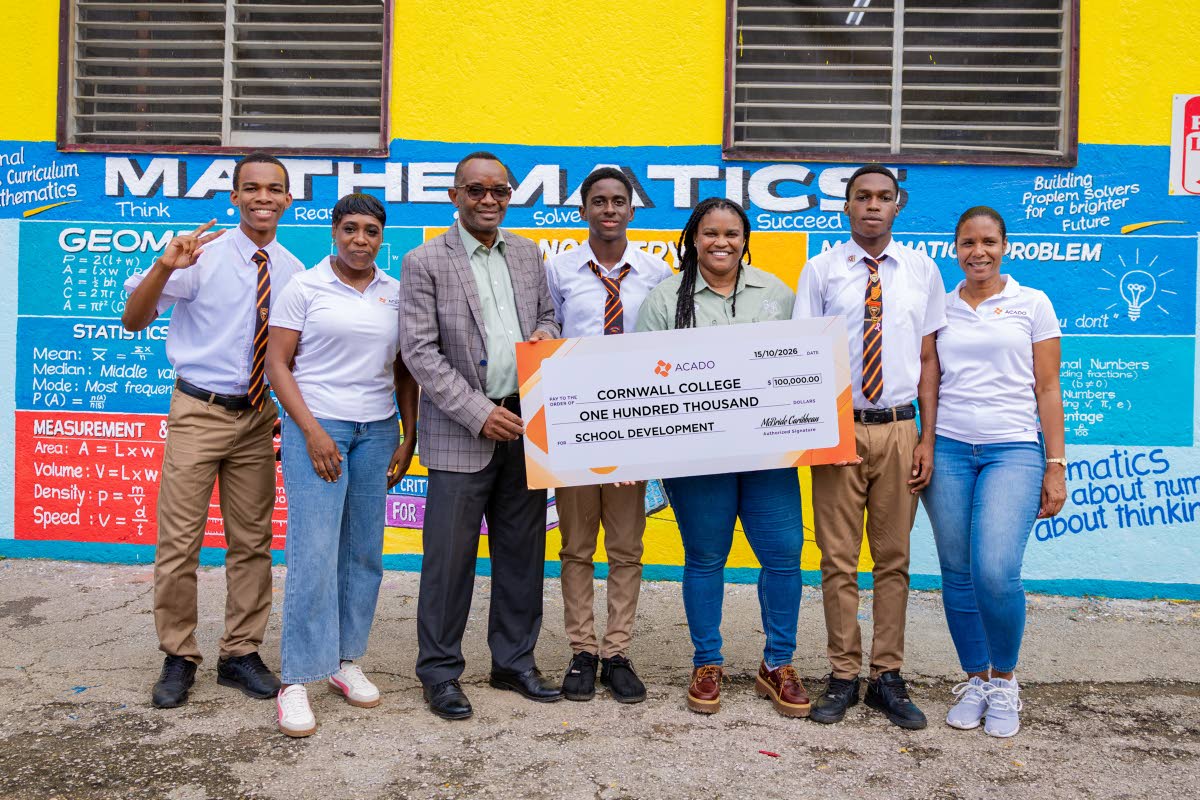 Students of Cornwall College join representatives of ACADO Jamaica and the Beep, Bop and Go brands during the presentation of a development fund donation from McBride Caribbean Limited. From left are student Raheem Grant; Tywan Hamilton, public relations c