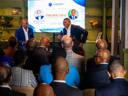 Kirk-Anthony Hamilton, founder of the Infiniti Partnership Inc. and The Visionaries’ Summit, in conversation with Prime Minister Dr Andrew Holness. 