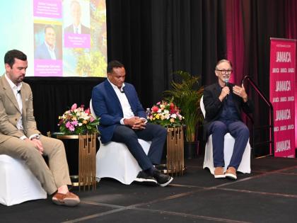 Kristopher DaCosta (centre) of the Jamaica Tourist Board and Accenture’s Dean Challis listen to RochHouse Hotel’s owner Paul Salmon (right) during a forum on artificial intelligence at the recently concluded JAPEX in Ocho Rios, St Ann.
