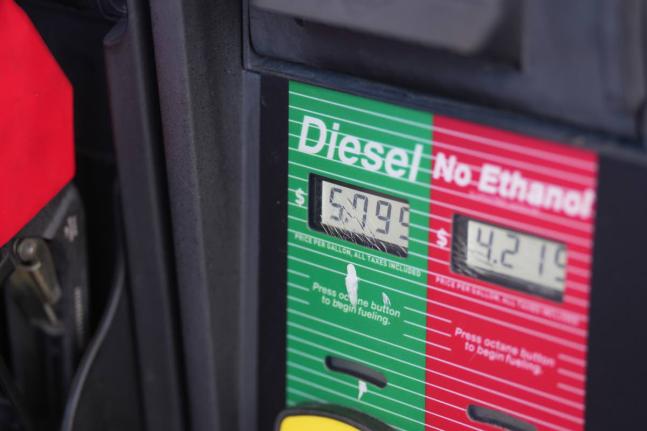 The price of a gallon of diesel fuel is shown electronically on a pump at a QuikTrip station, October 1, in Greenwood Village, Colorado.